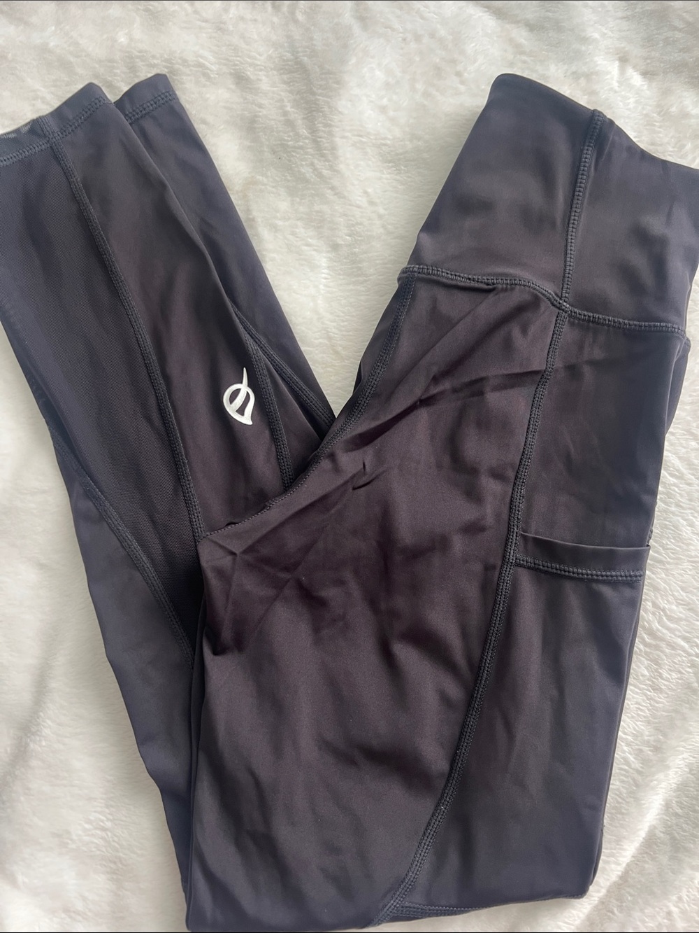 P'tula Black Performance Leggings with side pockets and beautiful mesh details